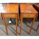 A pair of early 19th century small sized satinwood Pembroke tables, each fitted with a single drawer