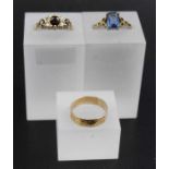 A collection of three 9ct gold rings, two stone set, combined weight: 6.7g