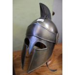 A metal Grecian design full face helmet
