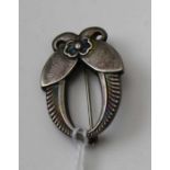 A Georg Jensen, Denmark, silver brooch, stylised floral and fern frond design, makers marks and refe