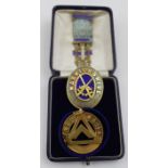 A collection of three Warwickshire Masonic items, includes a pendant, silver gilt with enamel, Chest