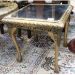 A gilt framed occasional table with a mirror top