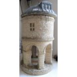 A three piece garden windmill in cast limestone and hand carved. Based on the Chesterton windmill.