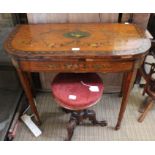 An early 19th century principally satin wood Sheriton design foldover card table, the central cartou