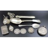 A quantity of silver items, includes sporting fobs, spoons, vesta case, coins, silver mounted cigar