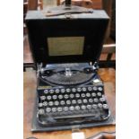 A cased Remington portable typewriter