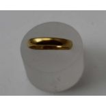 A 22ct gold plain wedding band 5.8g, ring size U
