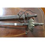 A Rapier and an Antique sword.