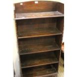 Oak five tier open book shelves.