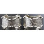 A pair of silver napkin rings, engraved decoration, Birmingham 1903
