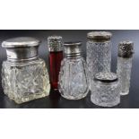 A Victorian ruby glass scent bottle, with silver top, Birmingham 1891, together with a cut glass sce