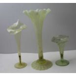 Three Victorian opaline glass vases, one of "Jack-in-the-Pulpit" form, the tallest a fluted one with