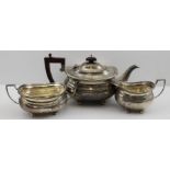 The Wilmot Manufacturing Co. A Georgian design silver three-piece tea set, comprising; teapot, milk