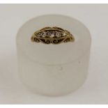 An 18ct gold diamond gypsy set ring, size; M 1/2, gross weight: 3.5g