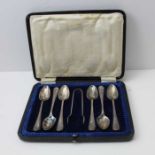 A collection of silver items, containing; a tankard, mustard, cigarette case, case with shoe horn &
