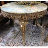 A circular onyx top table, on brass frame base