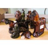 A collection of moulded glass perfume bottles.