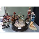 A selection of Royal Doulton figures to include 'The Foaming Quart', 'Tall Story', 'Omar Khayyam', e