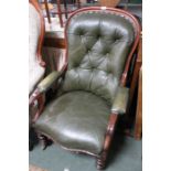 A Victorian mahogany framed open armchair/daily room chair. Green button leather, scroll arms
