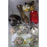 A box of mixed collectables to include figureens and houses.