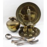 A collection of Middle Eastern brassware, includes a coffee set with pot and cups on tray, together