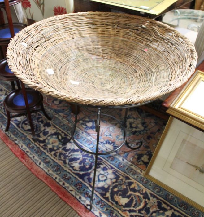 A metal based dish topped occasional table, 73cm x 70cm