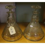 A pair of early 19th century semi ships decanters, with step & slice cutting together with mushroom