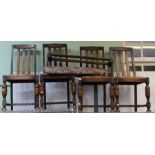 Four oak slat back dining chairs with a matching footstool.