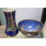A Devon Lustre ware vase 24cm high and a Carltonware bowl 23.5cm in diameter