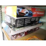 Four boxed car racing games to include Scalextric