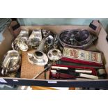 A quantity of silver plate includes an epergne, pair of sauce boats, cutlery etc