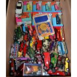 A box of various die-cast vehicles