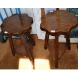 A pair of two-tier oak tables with petal tops on three legs, 45cm in diameter