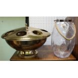 A large brass wine cooler and a large vessel with rope handle