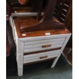 A pair of part painted bamboo two drawer chests