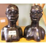 A pair of hand carved African hardwood busts