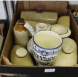 A box of pottery footwarmers etc