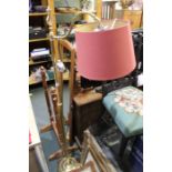 A standard brass lamp with shade.