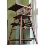 A Vintage metamorphic wooden child's high chair