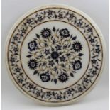 An Indian inlaid marble table top, the flowers with mother-of-pearl highlights, 35cm dia