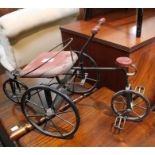 A model of a vintage pedal powered tricycle