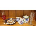 A shelf full of collectable china and glassware from the 19th and 20th century