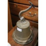 A cast brass hanging bell
