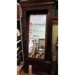 A mahogany mirror door wardrobe, 81cm wide