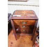 A late 19th century marquetry inlaid small table cabinet, doors open to reveal three