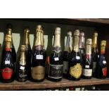 A shelf full of champagne and other sparkling wines