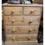 A five drawer pine chest