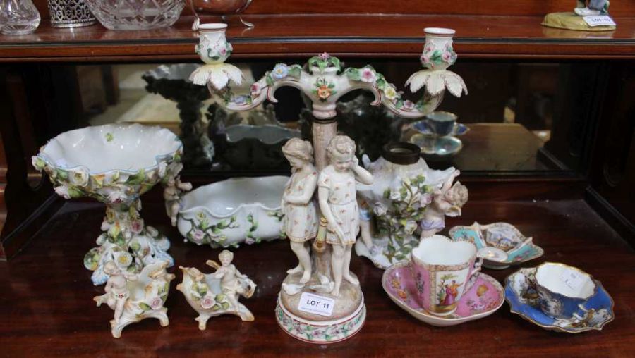 Continental ceramics, flora encrusted includes two tier figurative candelabra, Coalport, oil lamp ba