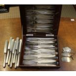 Three HM silver decanter labels with a cased set of fish knives and forks and silver handled fruit