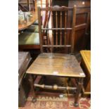 A 19th century elm seated spindle back chair